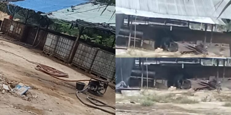 Foto lokasi diduga tempat penyulingan minyak mentah ilegal di Desa Muara Bahar Kecamatan Bayung Lencir Musi Banyuasin Sumatera Selatan dengan sejumlah peralatan drum penampung di area terbuka