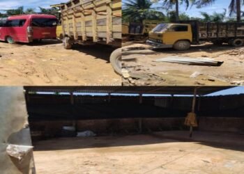 Foto lokasi di Jalan Budi Luhur, Kecamatan Tenayan Raya, Pekanbaru, menunjukkan area bengkel dan gudang mobil tanpa adanya aktivitas atau fasilitas penyimpanan BBM ilegal.